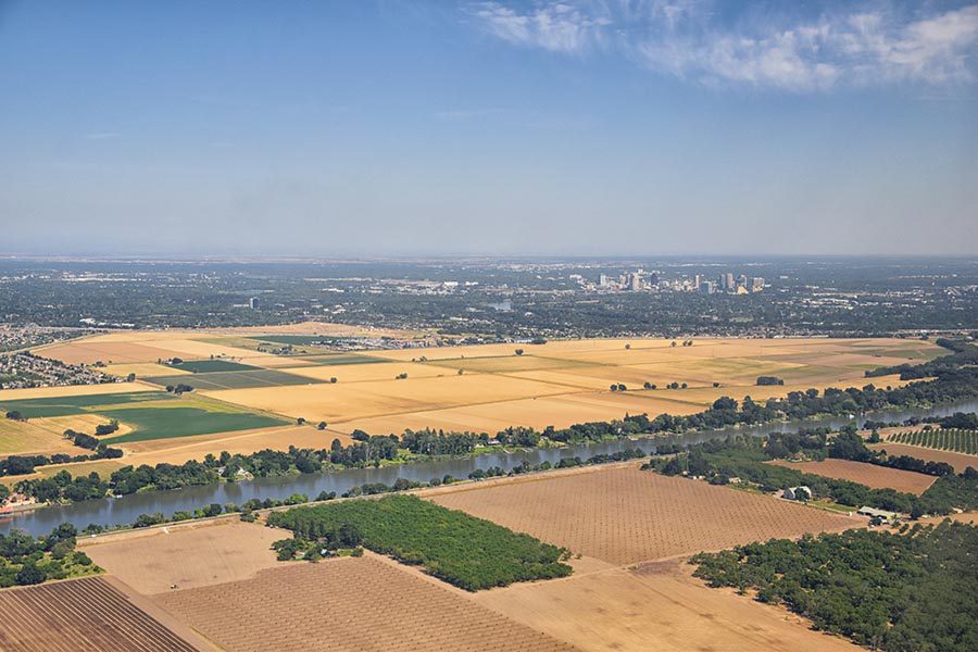 Roseville, CA Insurance - Aerial View of Area Surrounding Sacramento, California, With Farmland and a Blue Sky